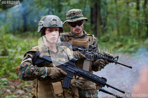 Image of Soldier Woman as a Team Leader