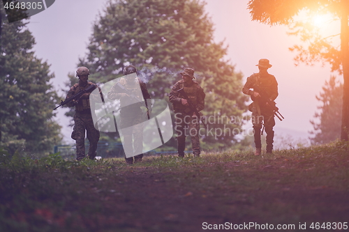 Image of soldiers squad relaxed walking