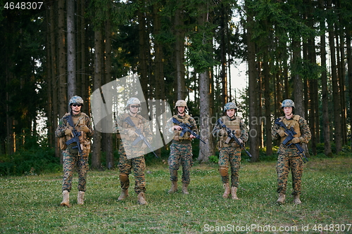 Image of Modern warfare Soldiers  Squad  in battle