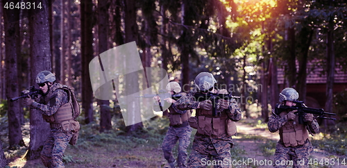 Image of Modern warfare Soldiers  Squad  in battle