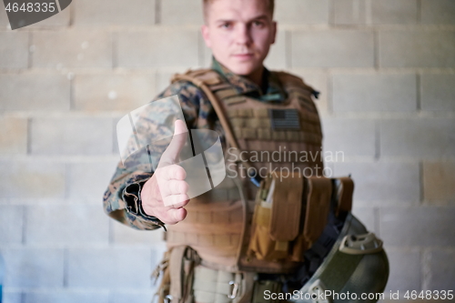 Image of Soldier Extending Hand To Shake