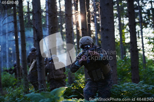 Image of Modern warfare Soldiers  Squad  in battle