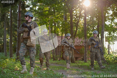 Image of Modern warfare Soldiers  Squad  in battle