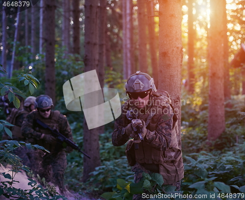 Image of Modern warfare Soldiers  Squad  in battle