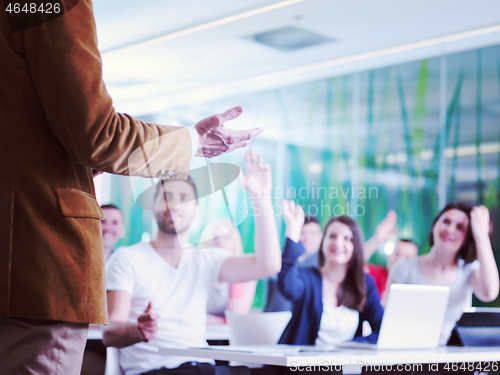 Image of close up of teacher hand while teaching in classroom