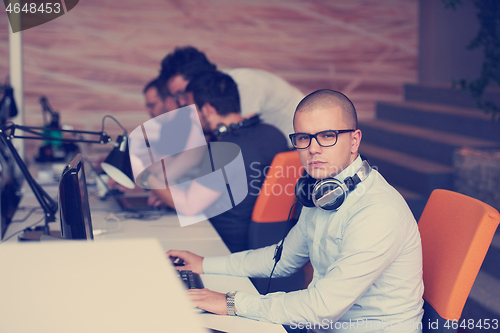 Image of startup business, software developer working on computer