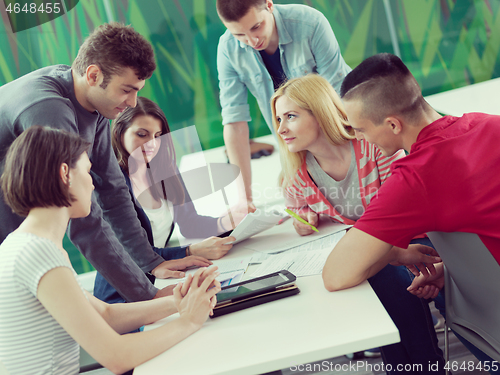 Image of group of students study together in classroom