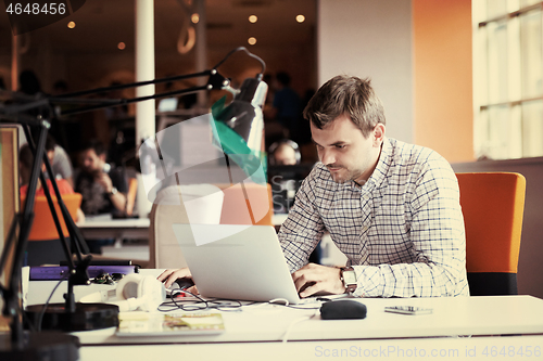 Image of startup business, software developer working on computer