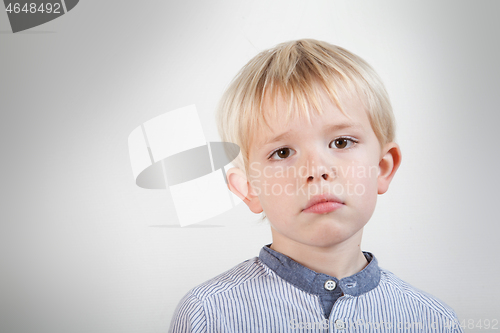 Image of Portrait of a scandinavian young boy in studio