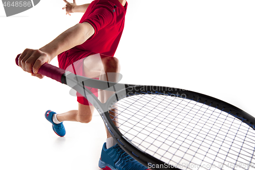 Image of Young tennis player isolated on white