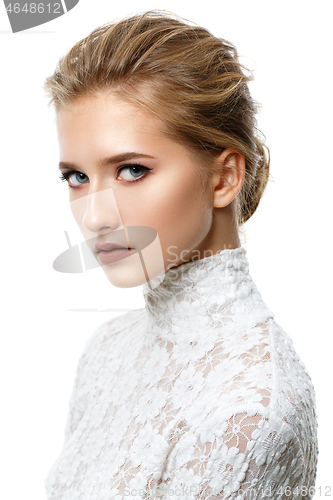 Image of beautiful dark blonde girl with natural makeup isolated on white