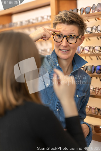 Image of woman in a eyewear store