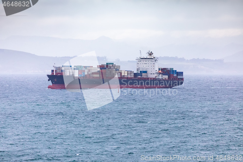 Image of a container ship at the sea