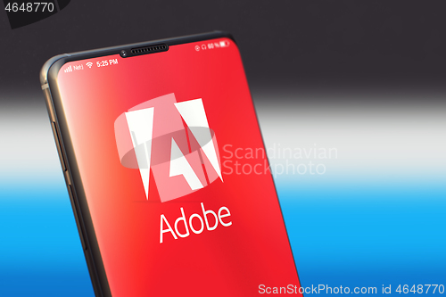 Image of KYIV, UKRAINE-JUNE, 2020: Adobe on Mobile Phone Screen. Social Network Concept