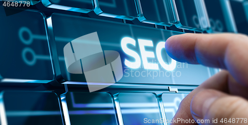 Image of SEO - Man Pushing Button on Futuristic Interface.