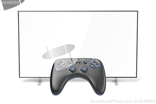 Image of Gaming controller and TV