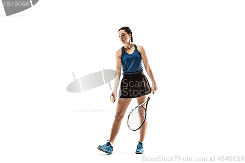 Image of Full length portrait of young woman playing tennis isolated on white background