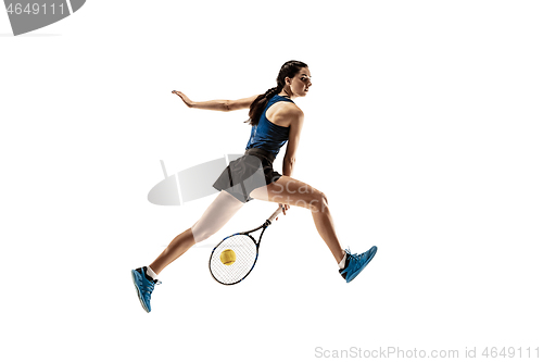 Image of Full length portrait of young woman playing tennis isolated on white background