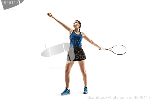 Image of Full length portrait of young woman playing tennis isolated on white background