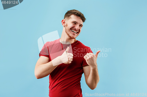 Image of Isolated on pink young casual man shouting at studio