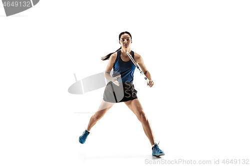 Image of Full length portrait of young woman playing tennis isolated on white background