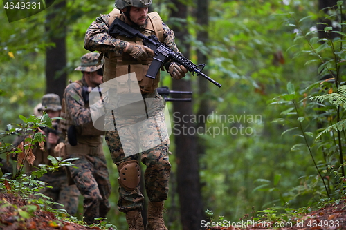 Image of Modern warfare Soldiers  Squad  in battle