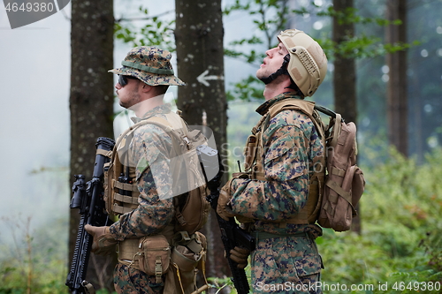 Image of soldiers squad relaxed walking