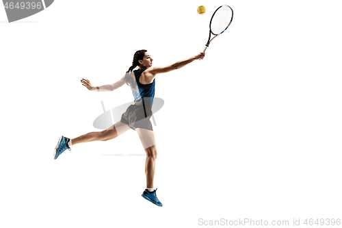 Image of Full length portrait of young woman playing tennis isolated on white background