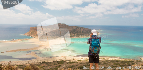 Image of Tourist taking photo of Balos beach at Crete island in Greece