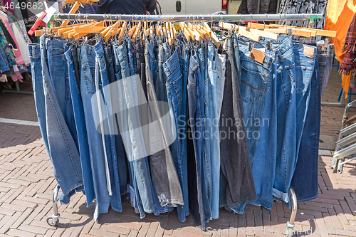 Image of Hanging Jeans Pants