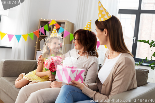 Image of granddaughter greeting grandmother on birthday