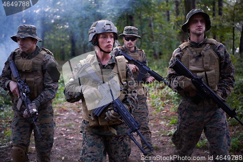 Image of Soldier Woman as a Team Leader