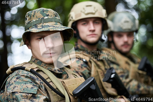 Image of soldiers squad relaxed walking