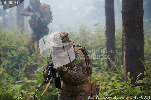 Image of Modern warfare Soldiers  Squad  in battle