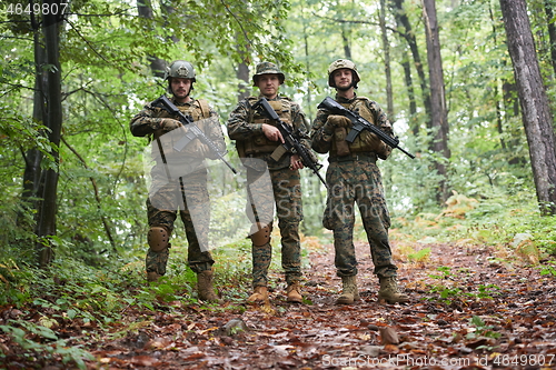 Image of soldiers squad relaxed walking