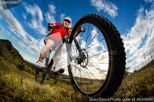 Image of Mountain Bike cyclist riding single track outdoor