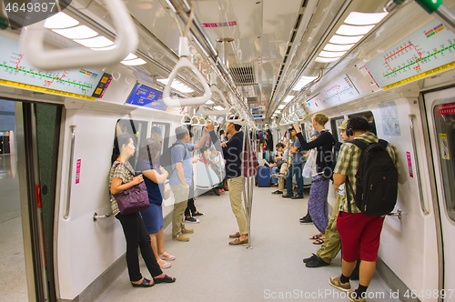 Image of People inside subway train. Singapore