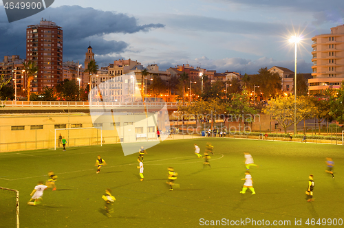 Image of Football match at twilight
