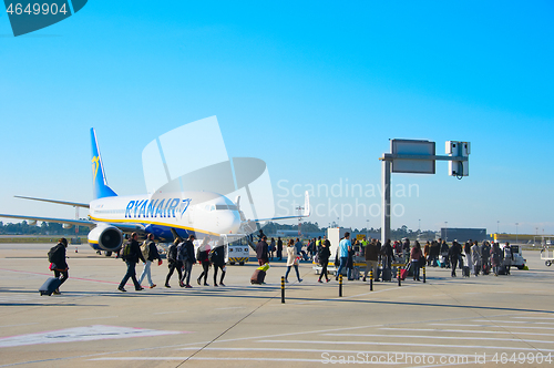 Image of Passengers boarding plane, Porto, Portugal