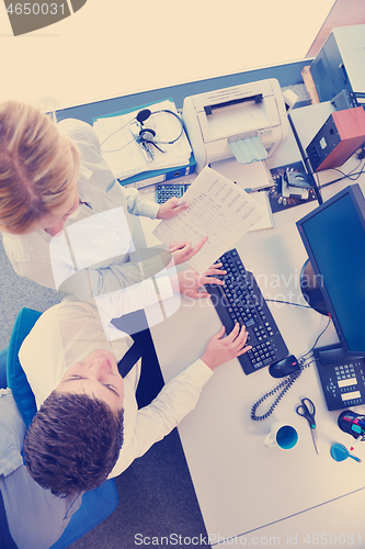 Image of business people in a meeting at office