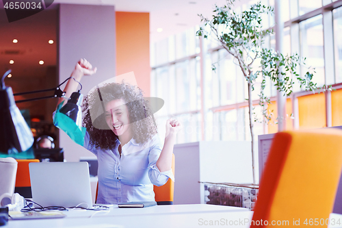 Image of young  business woman at office