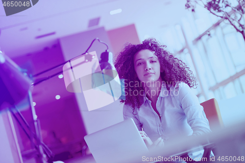 Image of young  business woman at office