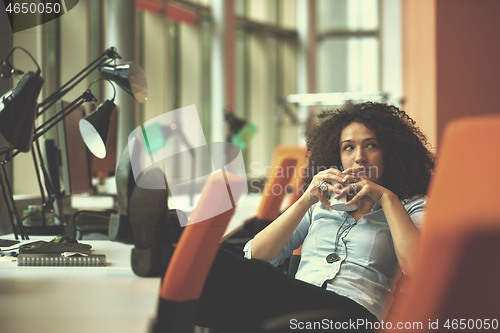 Image of young  business woman at office