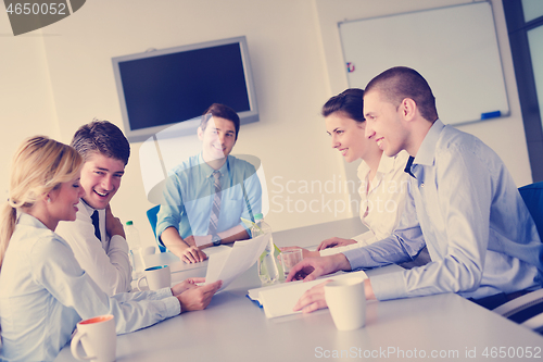 Image of business people in a meeting at office