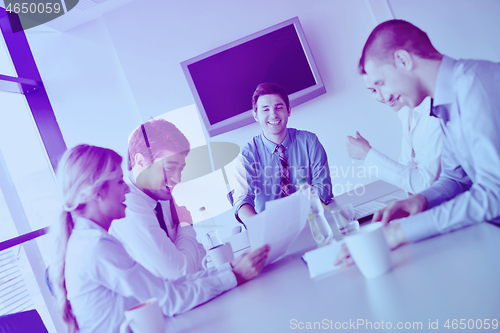 Image of business people in a meeting at office