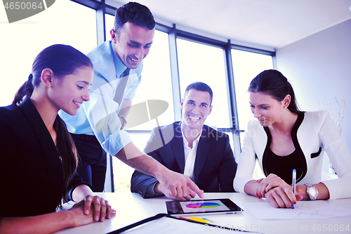 Image of business people group in a meeting at office