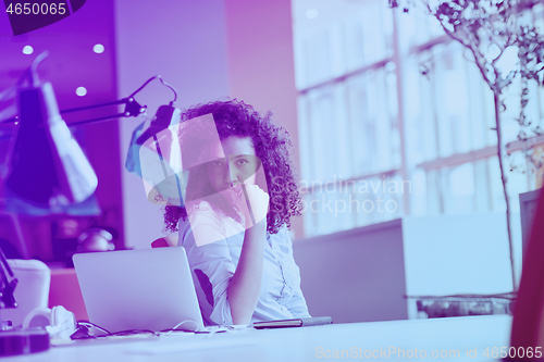 Image of young  business woman at office