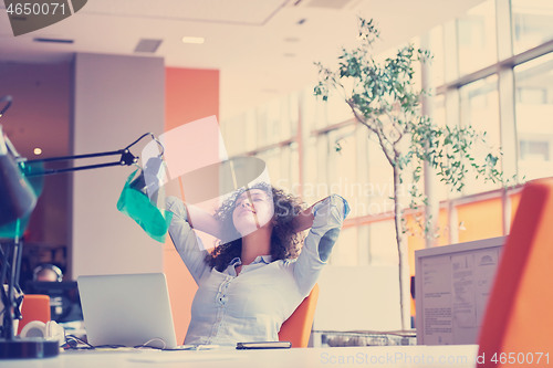 Image of young  business woman at office