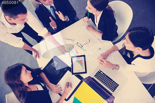 Image of business people group in a meeting at office