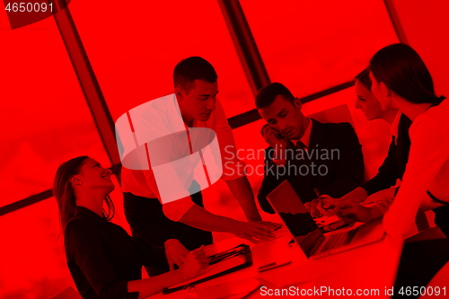 Image of business people group in a meeting at office